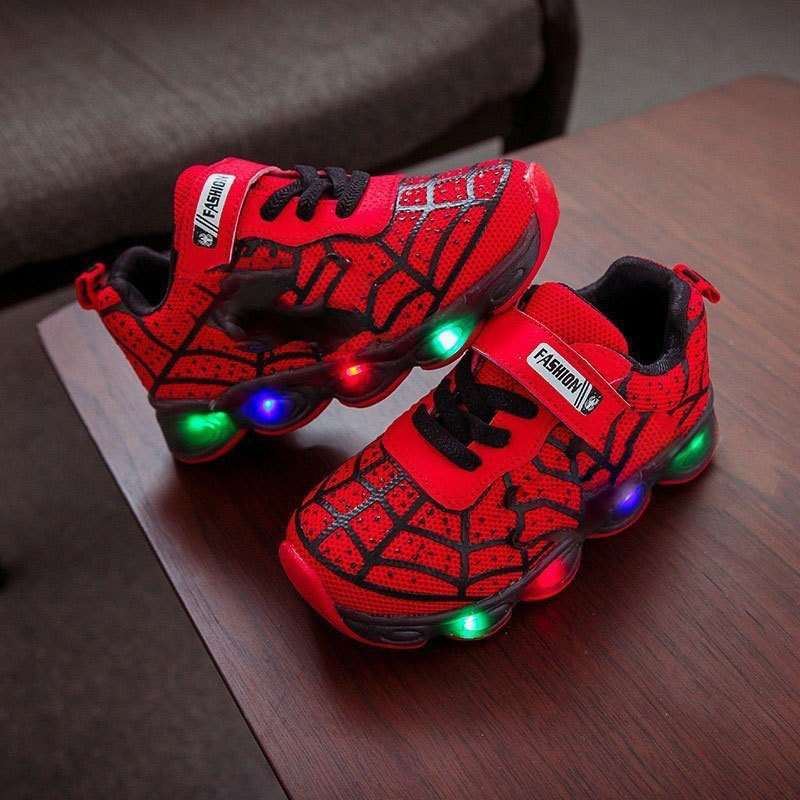 Durable kids' superhero light-up sneakers with LED lights, perfect for active boys & girls on the playground.