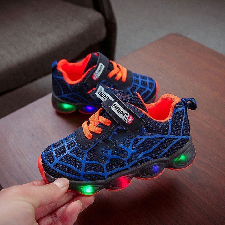 Tough children's light-up superhero sneakers, great for active wear, providing fun & durability for all kids.