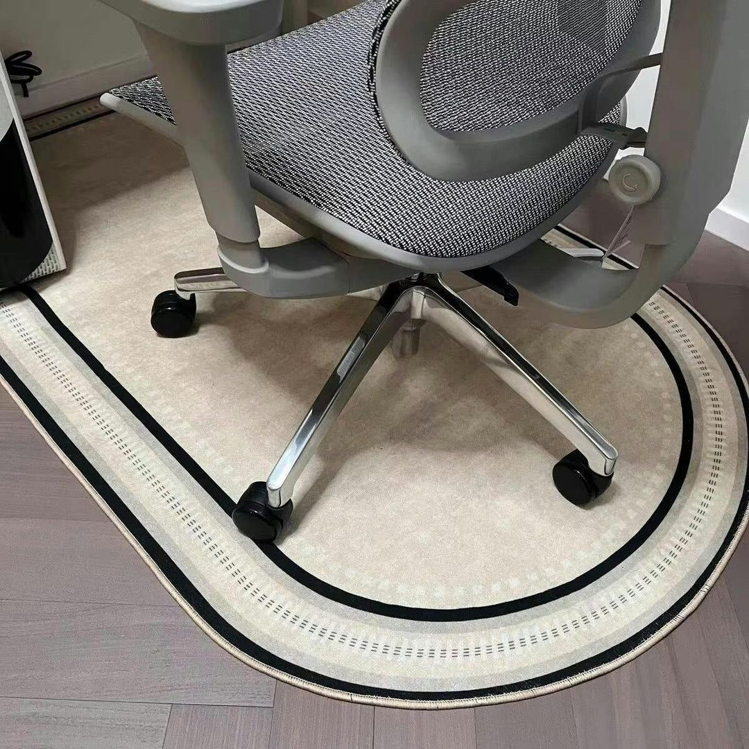 Durable office chair mat with non-slip backing for floor protection & smooth chair rolling on hard surfaces.