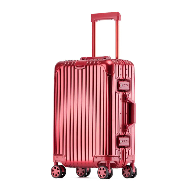 Reinforced protective corners on a durable unisex aluminum-magnesium hard shell travel suitcase for safety.