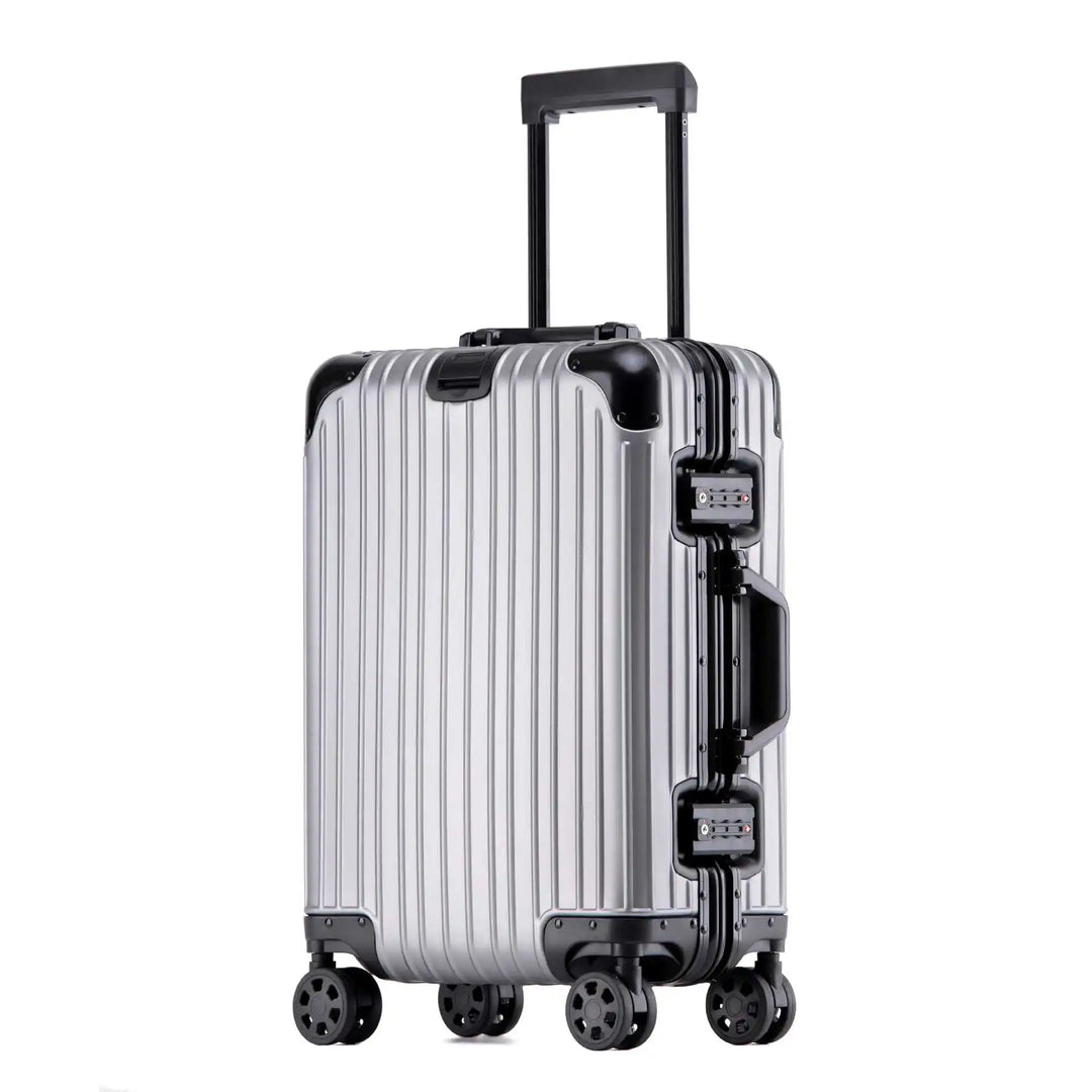 Unisex aluminum-magnesium hard shell travel suitcase with effortless spinner wheels, easily pulled by traveler.