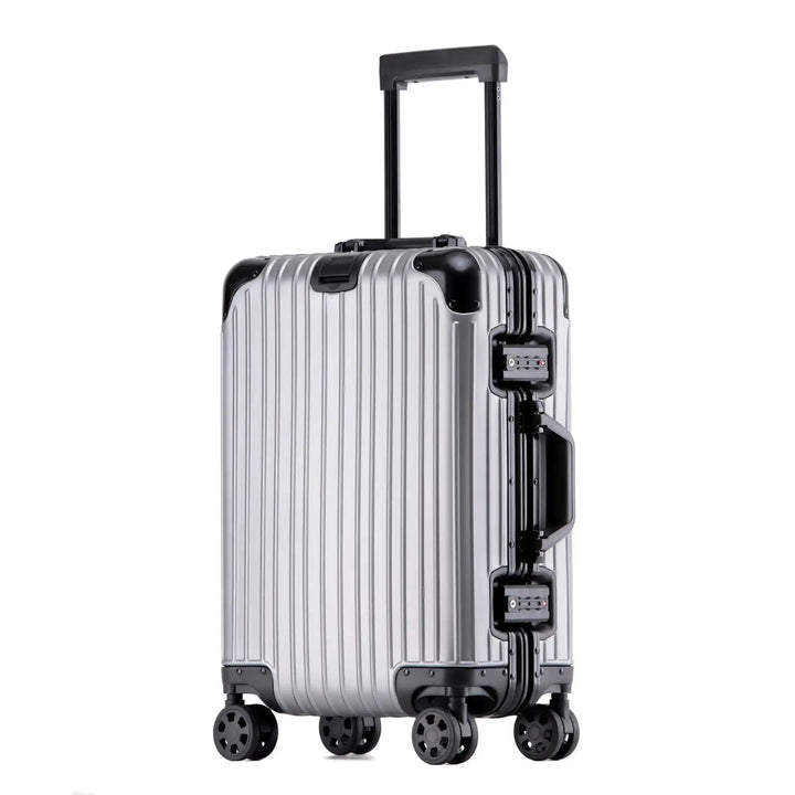Unisex aluminum-magnesium hard shell travel suitcase with effortless spinner wheels, easily pulled by traveler.