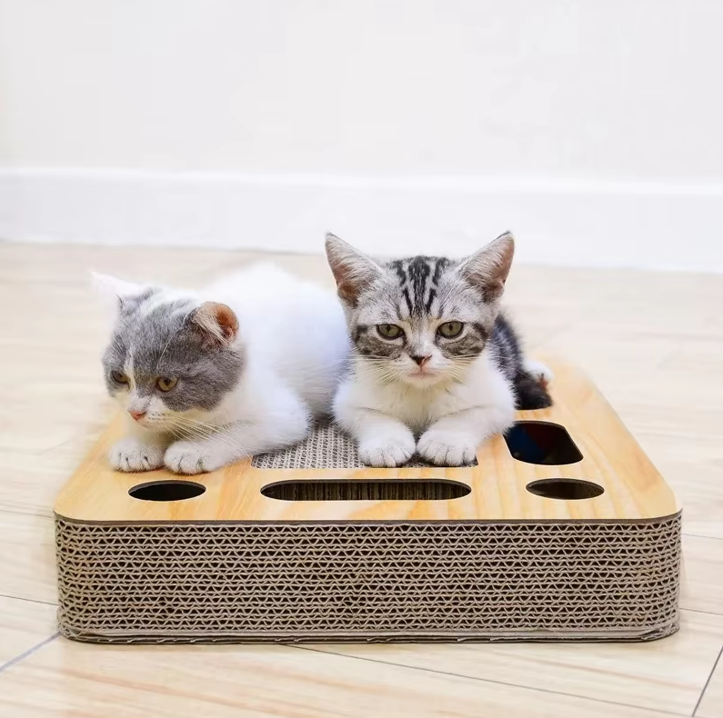 High-quality wood and corrugated cardboard cat scratcher. Durable scratching board with an engaging interactive toy.