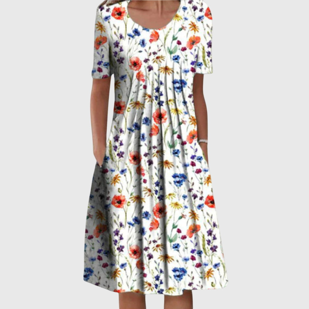 Elegant women's floral round neck dress. Perfect for spring & summer fashion, offering effortless style for any occasion.