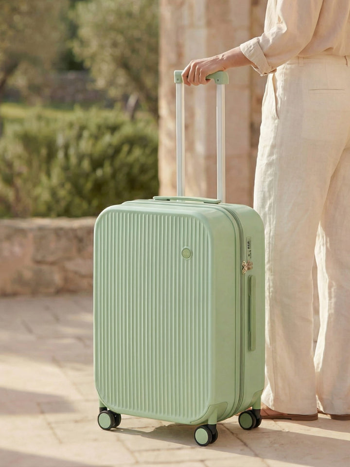 Lightweight hard-shell spinner suitcase with durable wheels, perfect for organized travel & airport navigation.