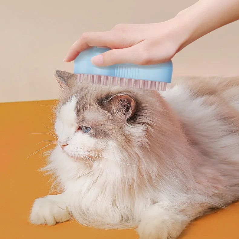 Electric cat grooming brush with massage function for deshedding & general pet care.