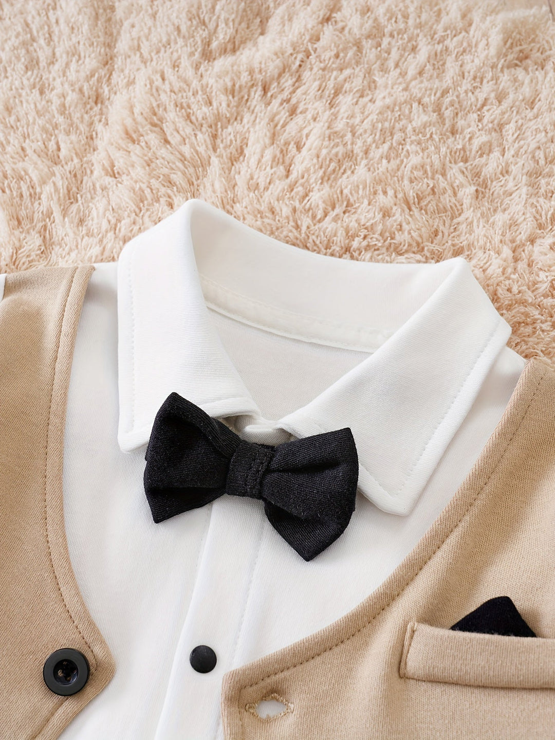 Comfortable baby boy cotton romper, a charming gentleman outfit with a bow tie. Ideal for special occasions.