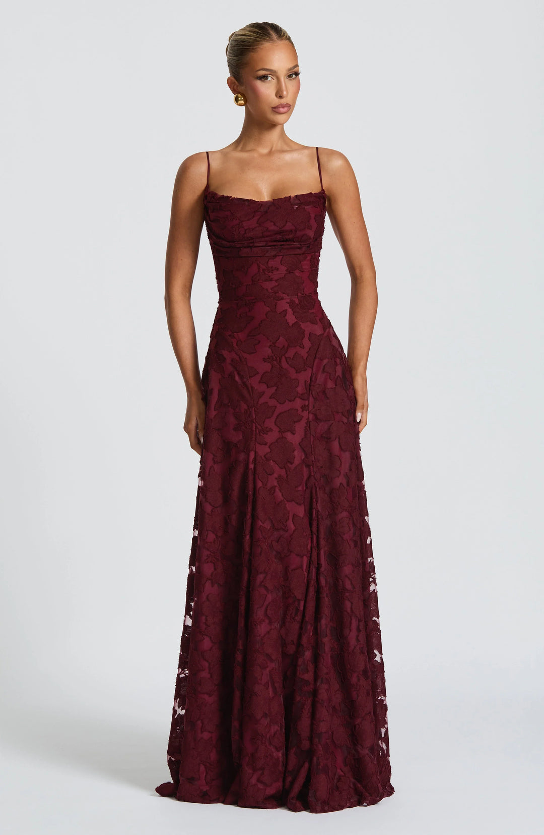 Elegant backless maxi dress for women with spaghetti straps. Perfect for evening or formal summer occasions.