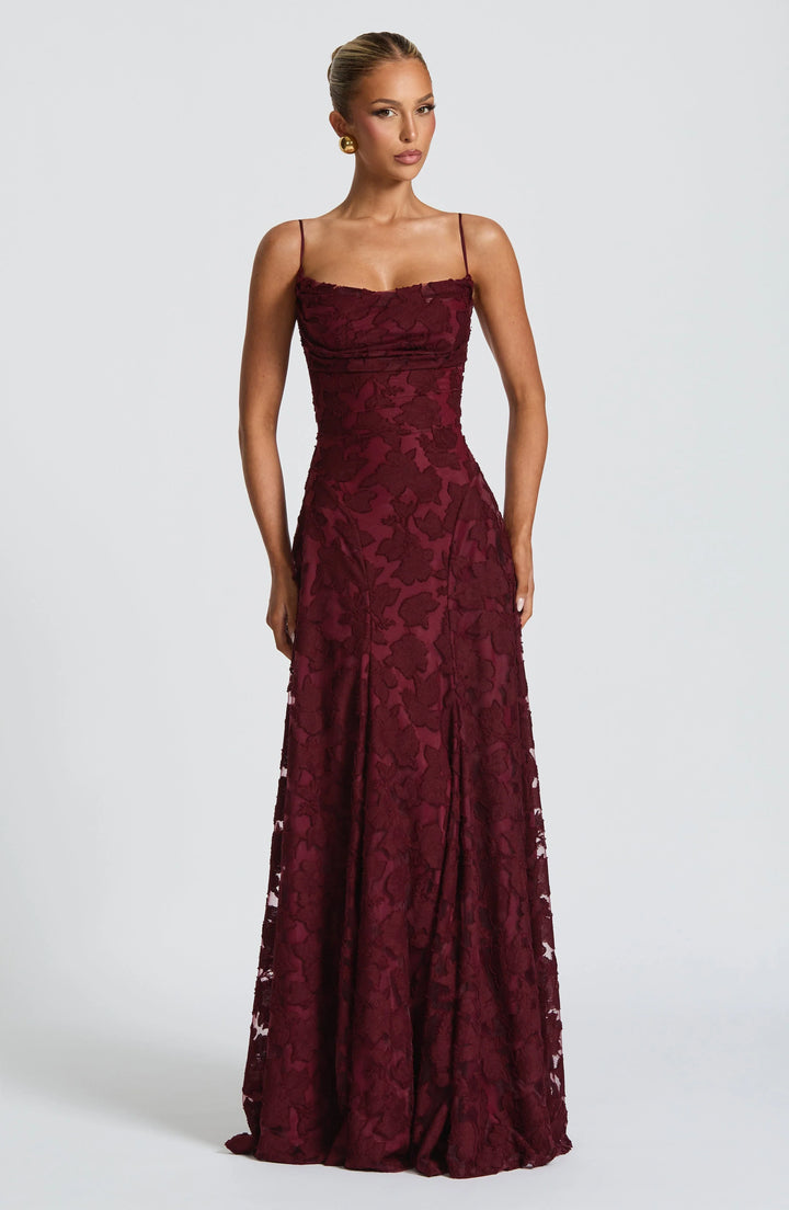 Elegant backless maxi dress for women with spaghetti straps. Perfect for evening or formal summer occasions.