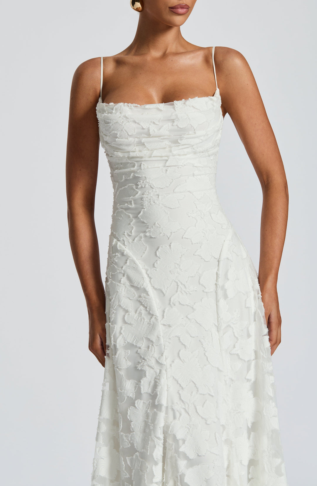 Elegant women's occasion dress, backless, flowy maxi, spaghetti straps, perfect for evening.