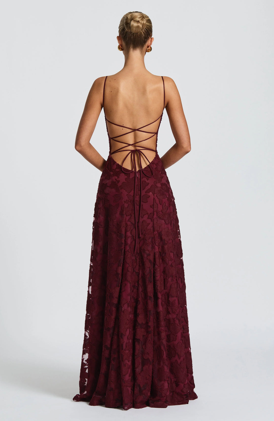 Summer occasion dress: elegant women's maxi, backless, flowy, with thin spaghetti straps.