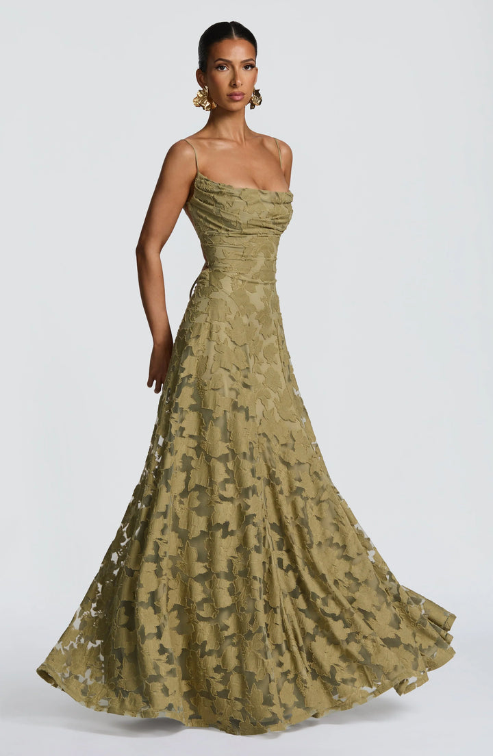 Elegant women's backless evening dress, flowy maxi with thin spaghetti straps.