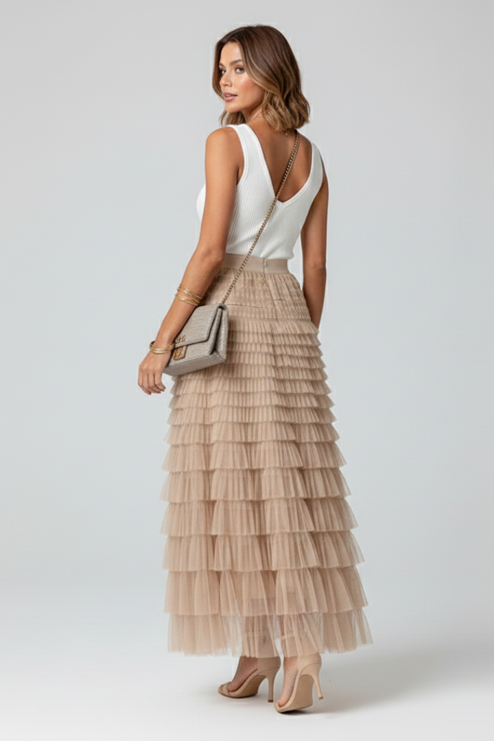 Lightweight beige layered tulle midi skirt with an elastic waist, a versatile women's summer skirt.