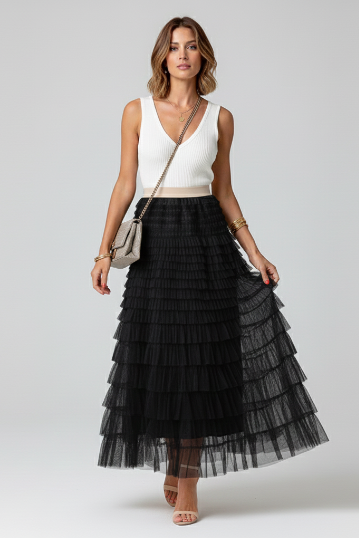 Chic black pleated tulle midi skirt with an elastic waist, a beautiful and comfortable women's party skirt.