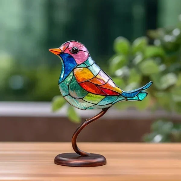 Elegant bird tabletop sculpture, artistic colored glass design for modern home decor.