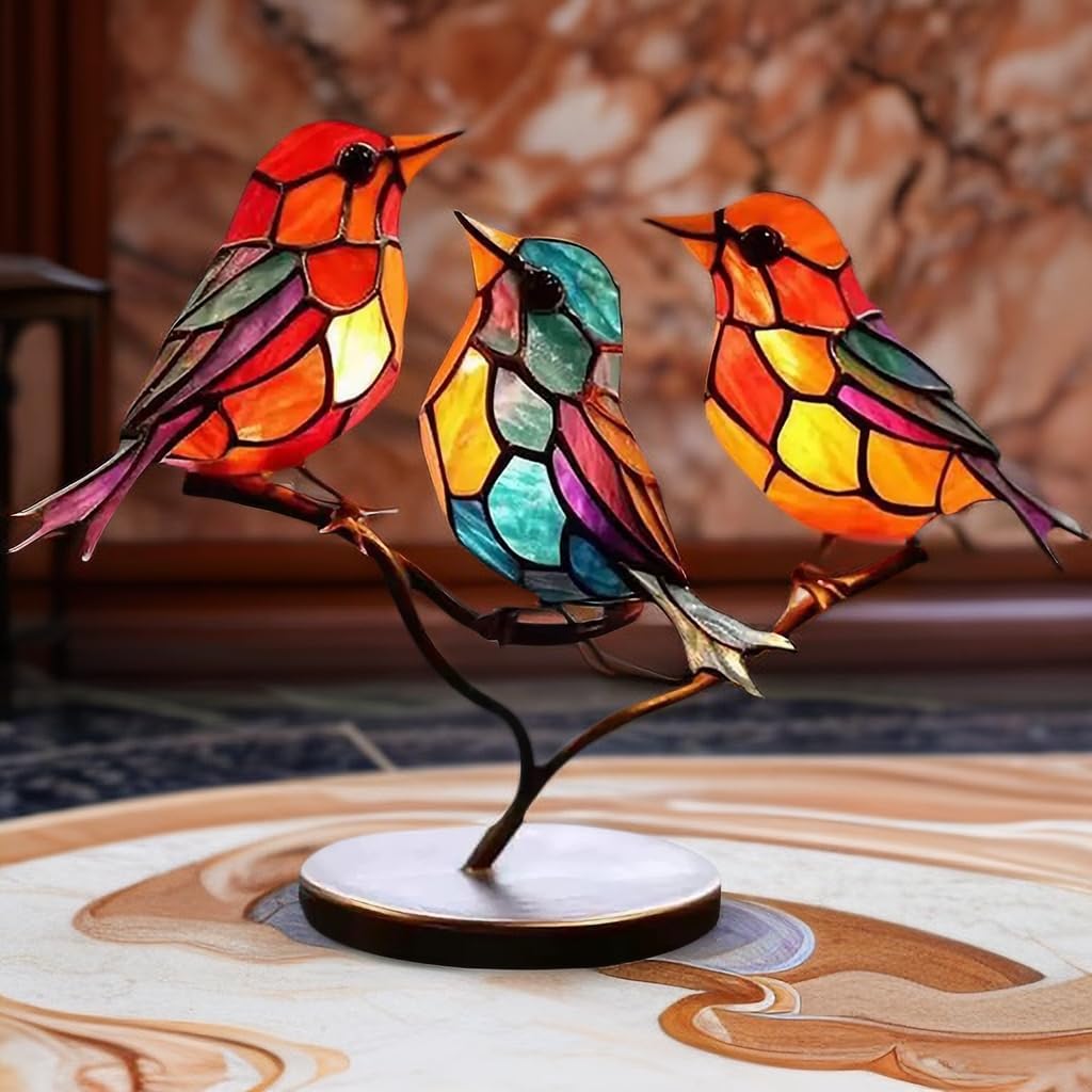 Nature-inspired bird sculpture, artistic colored glass, modern home accent decor.