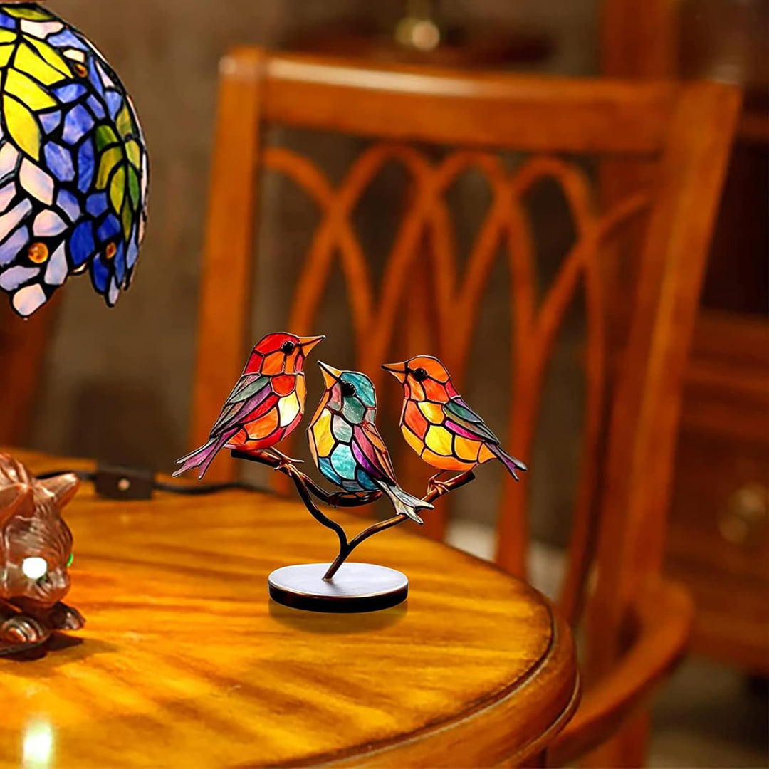 Vibrant colored glass bird sculpture, elegant modern artistic tabletop decor piece.