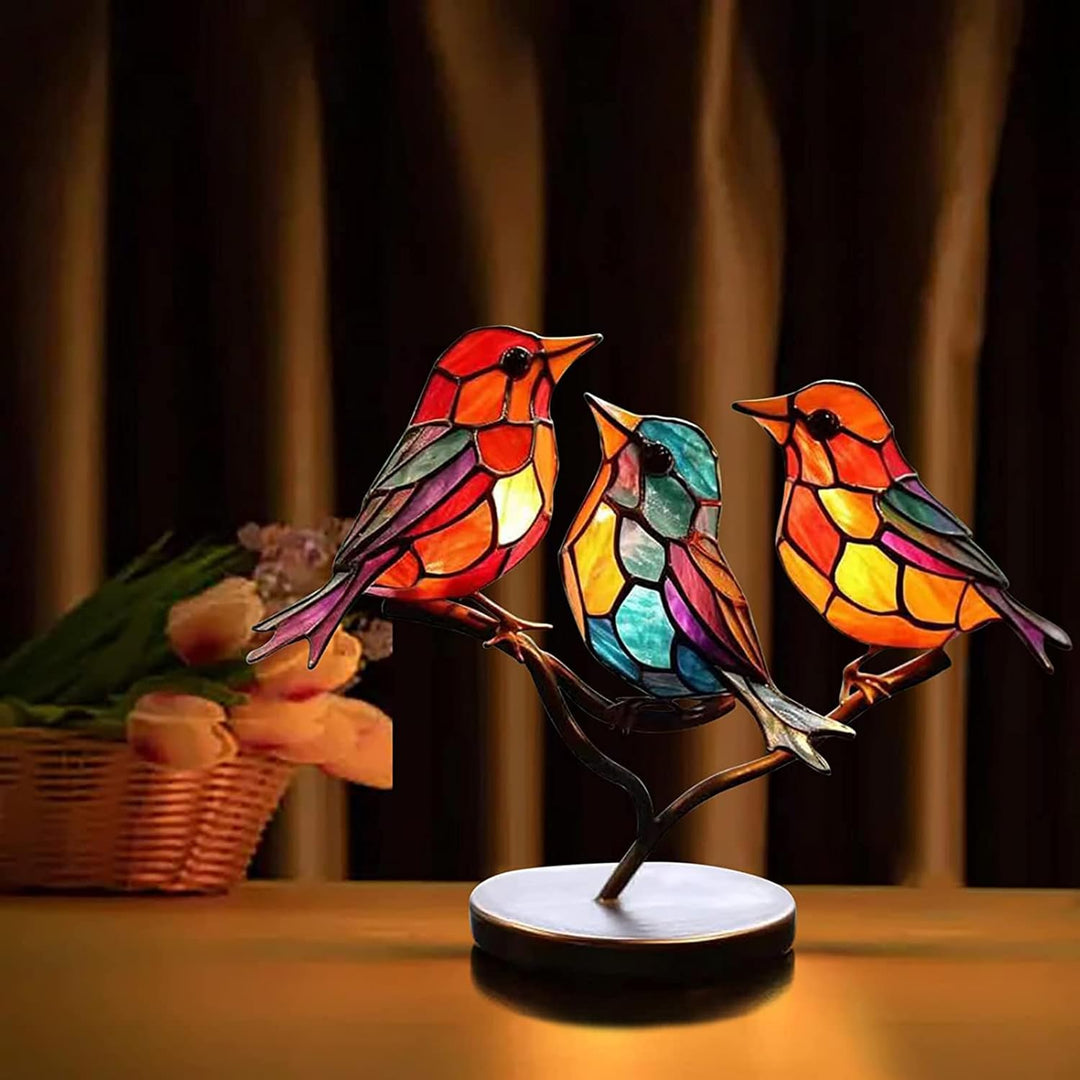 Decorative bird sculpture, elegant colored glass art, modern tabletop home accent.