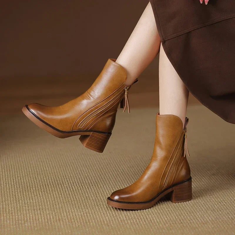 Versatile black ankle boots for women, chic and comfortable, essential for elegant winter outfits.