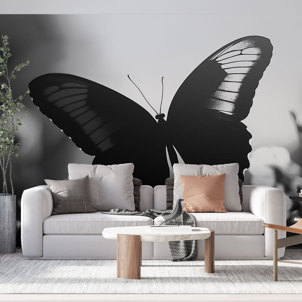 Elegant black butterfly wall mural on white background. Modern peel and stick wallpaper for stylish home decor.