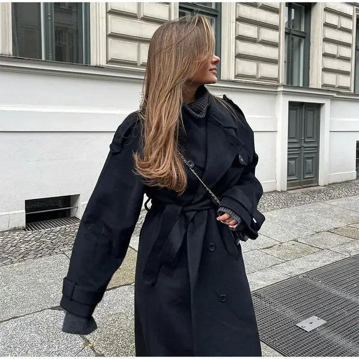 Classic black double-breasted trench coat, a versatile women's apparel item perfect for autumn and winter.