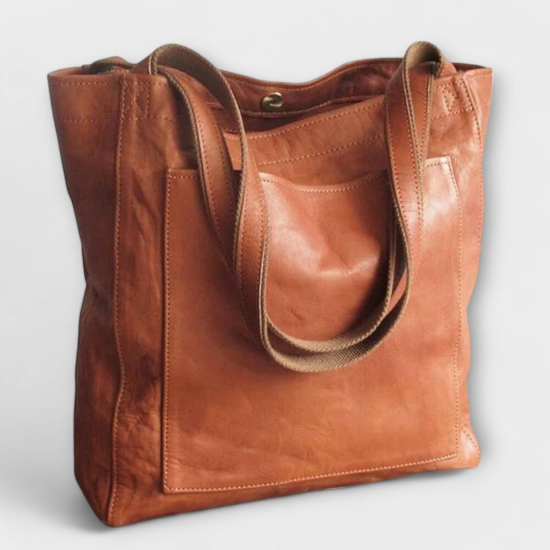 Elegant black faux leather shoulder bag for women, perfect for work or everyday use