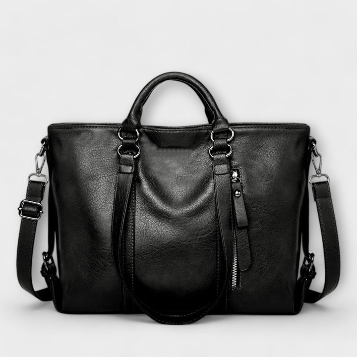 Fashionable women's structured shoulder bag, an elegant faux leather accessory for any outfit.