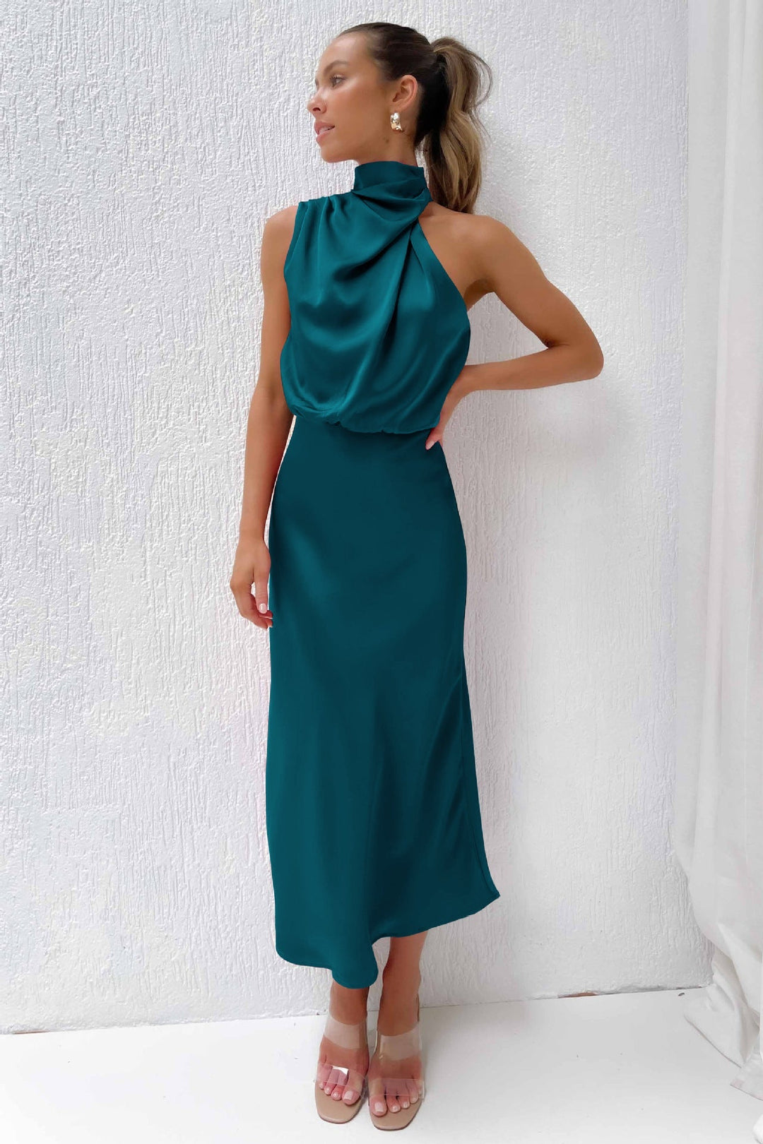 Women's luxurious black halter maxi dress, perfect for any formal or elegant event