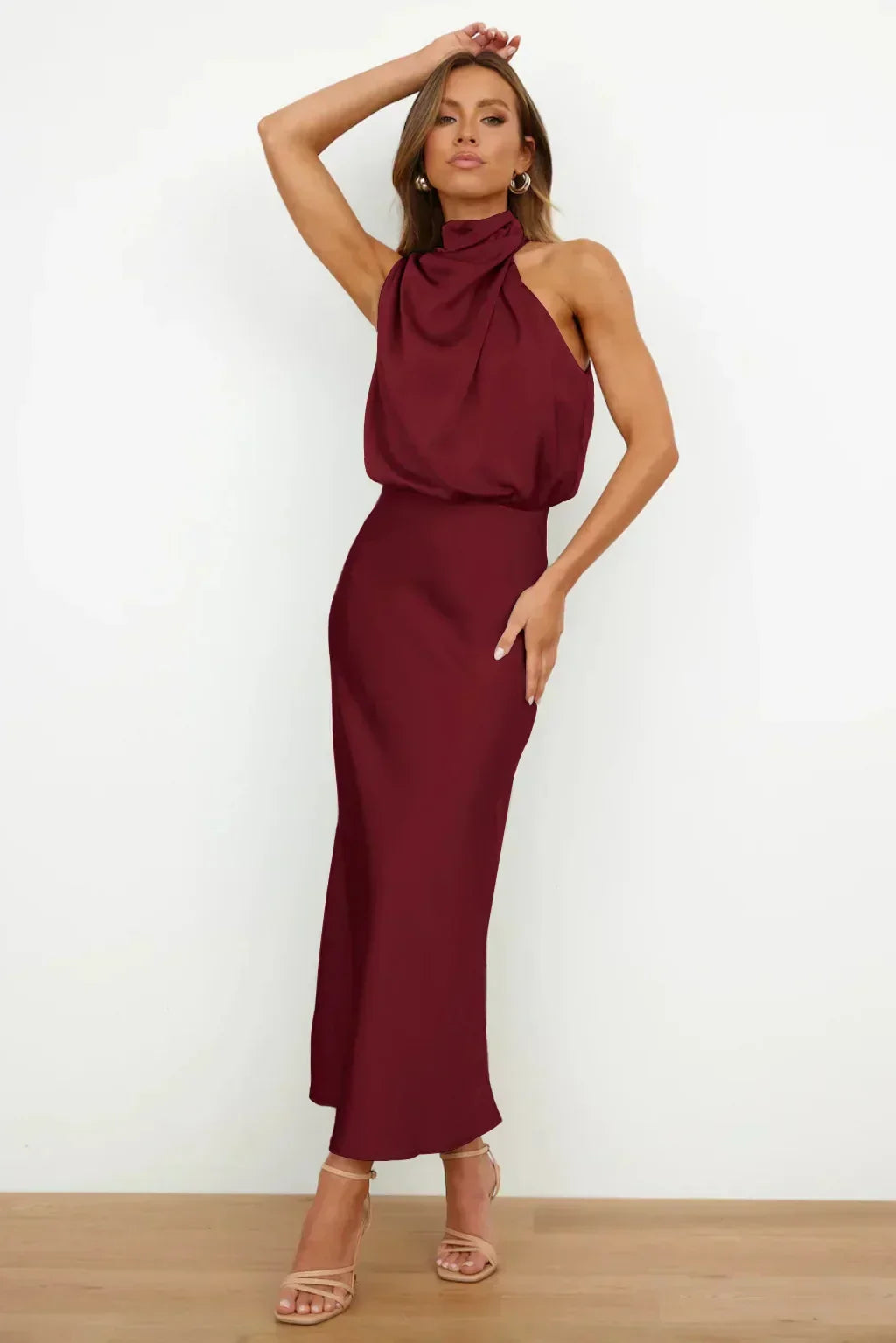 Women's stylish halter neck evening dress, designed for a chic and memorable look