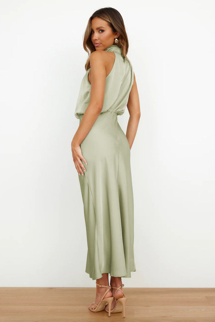 Stylish women's long halter dress, a sophisticated choice for evening wear and cocktails