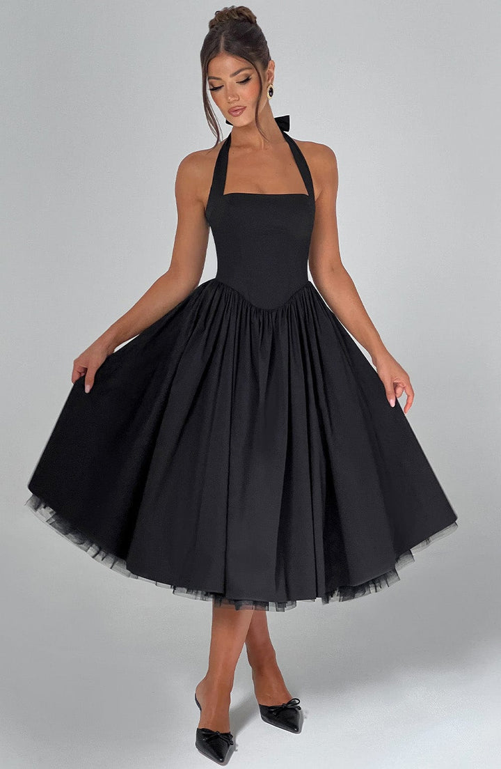 Elegant black party dress with a flattering halter neck design and midi cut.