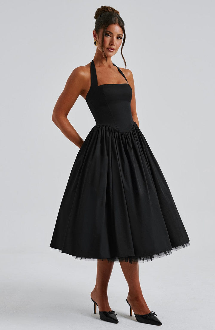 Versatile black formal midi dress, perfect as a wedding guest or evening party outfit.