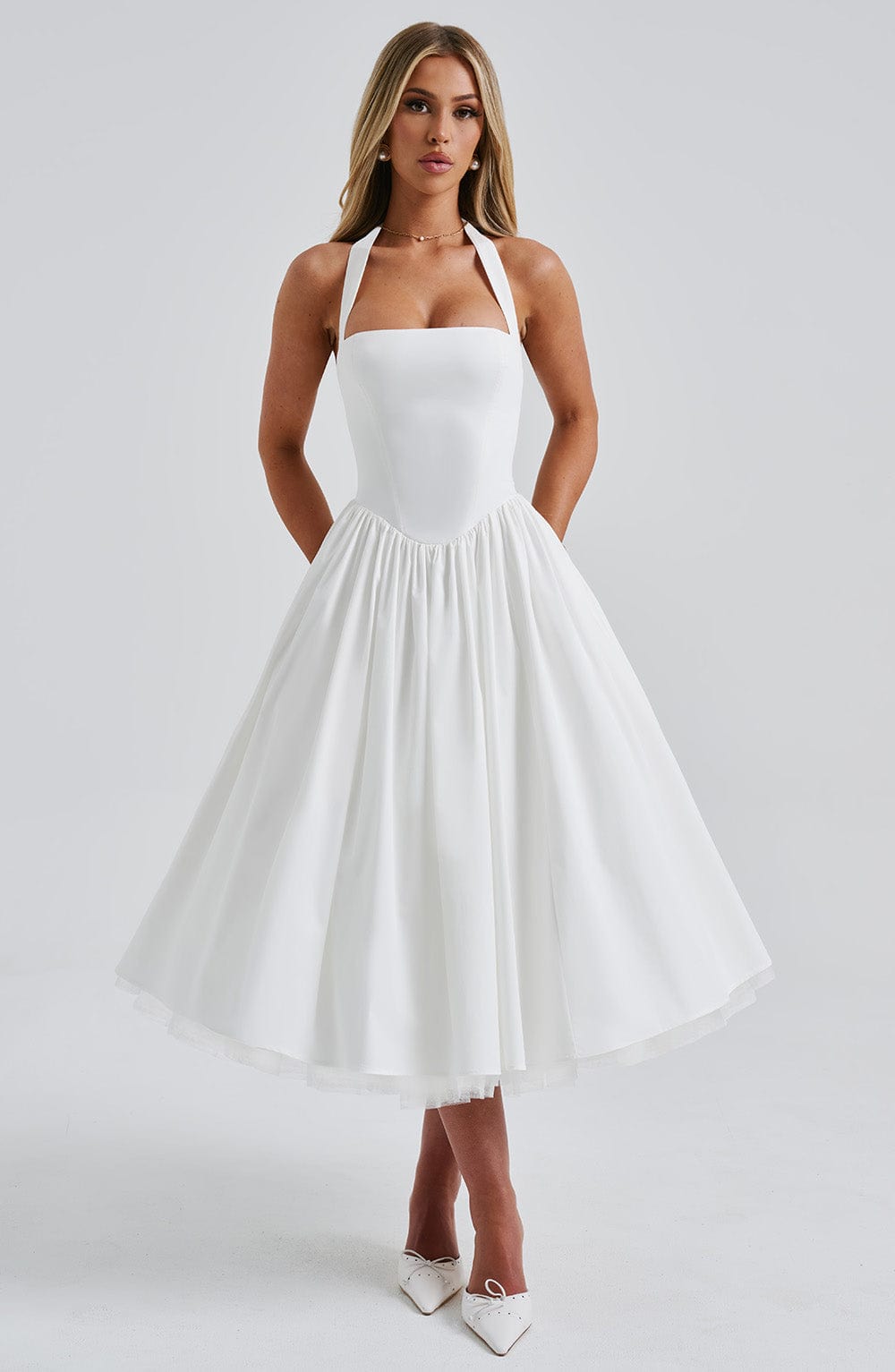 Beautiful black halter neck formal dress, flowy skirt, ideal for special occasions.