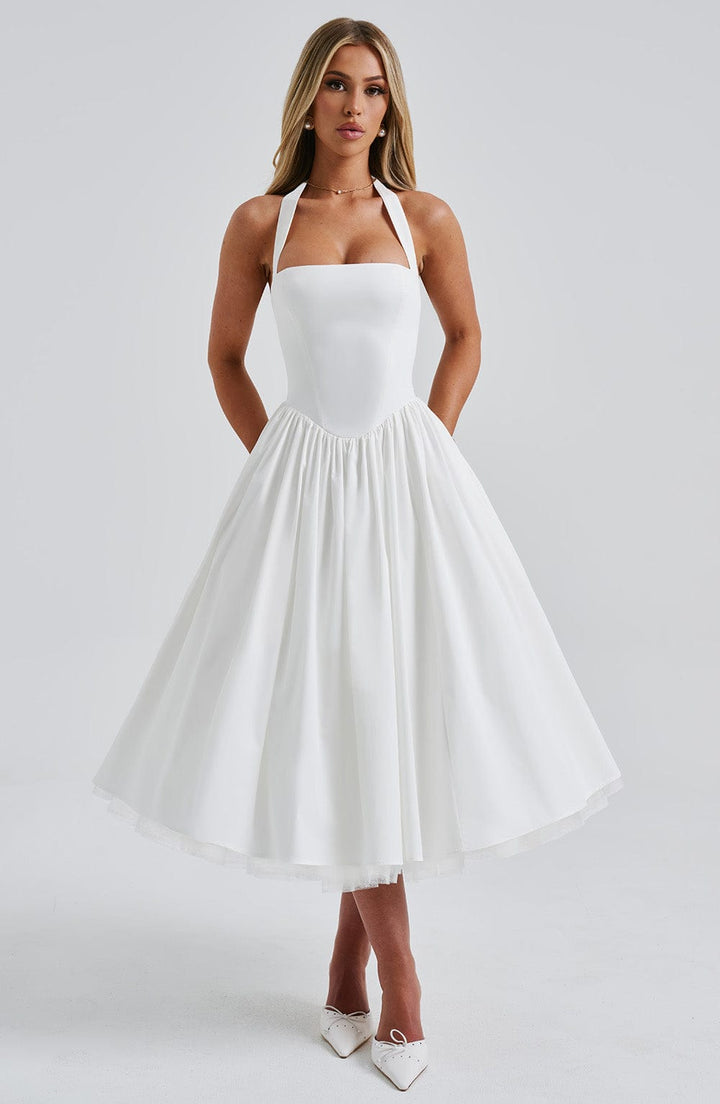 Beautiful black halter neck formal dress, flowy skirt, ideal for special occasions.