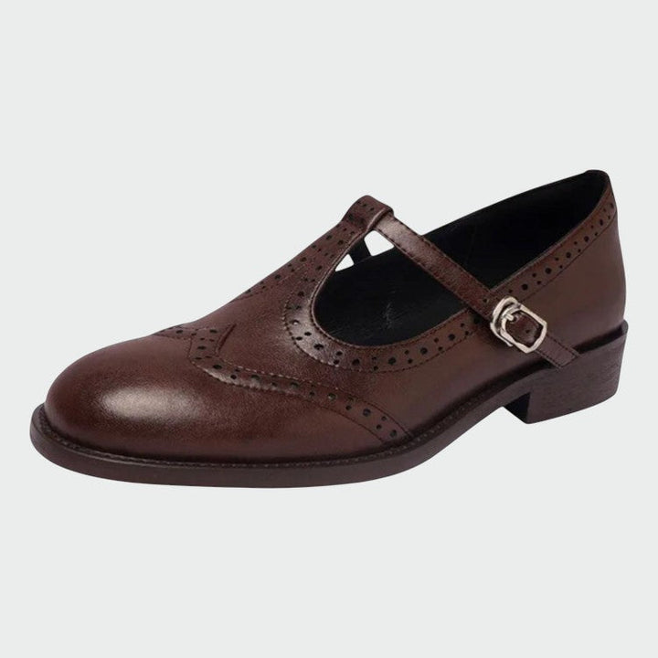 Side view of a comfortable women's leather Mary Jane shoe with a T-bar and low block heel