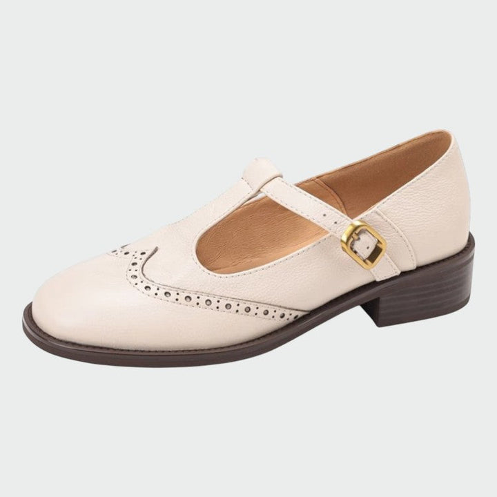 Detailed shot of the supple leather finish and buckle on a women's T-bar Mary Jane shoe