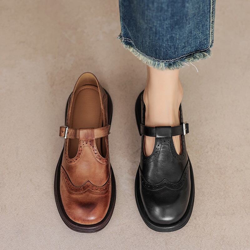Women's fashion leather T-strap Mary Janes with brogue detail, a timeless and comfortable flat