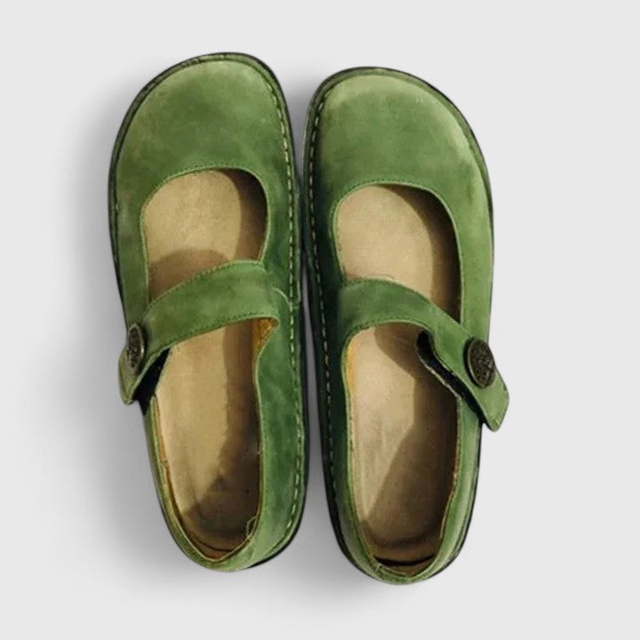 Stylish women's black Mary Jane shoes with a comfortable flat sole, ideal for casual and classic looks