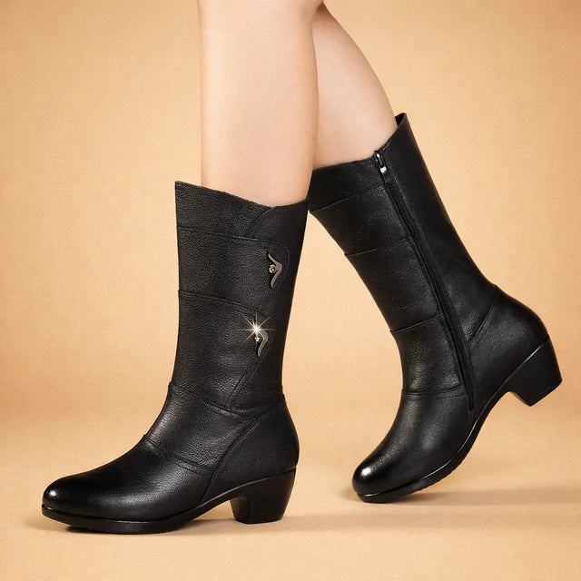 Elegant black mid-calf women's winter boots with sleek design, perfect for stylish cold weather fashion & daily wear.