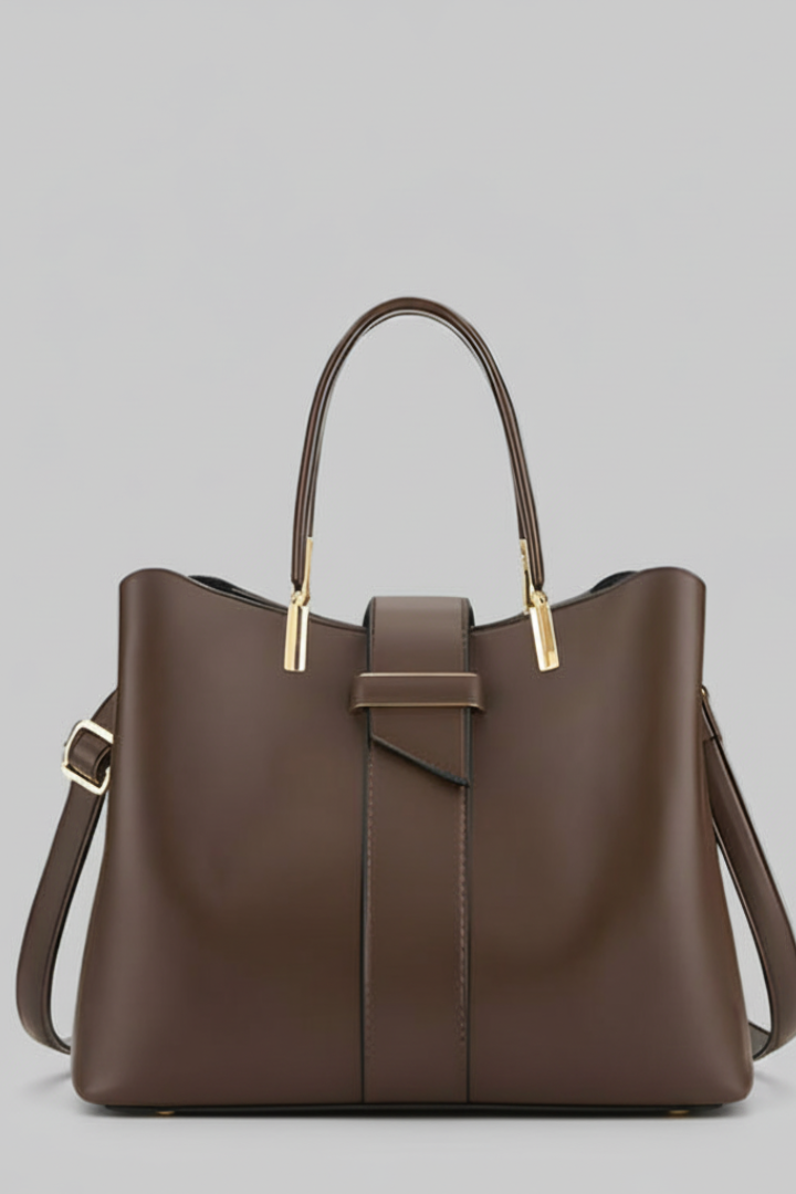 Elegant black structured shoulder bag with top handles, gold hardware, and a detachable strap, perfect for work or daily use