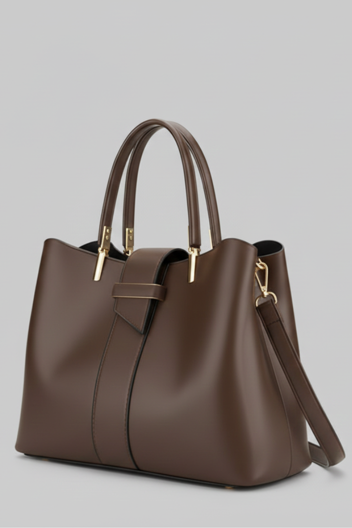 Women's sleek structured shoulder bag in a neutral color with a long strap, ideal for crossbody or hand carry, a fashion statement