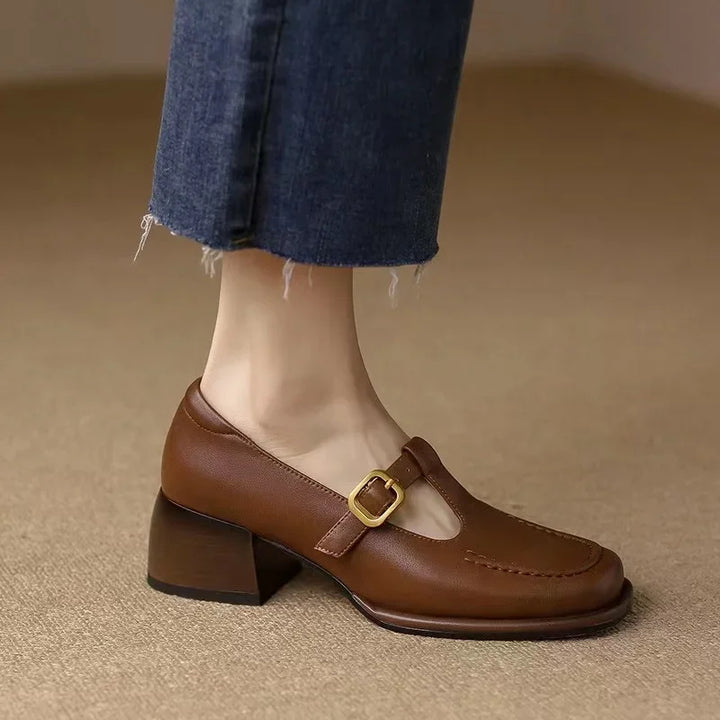Side view of women's comfortable block heel shoes with a chic T-strap design