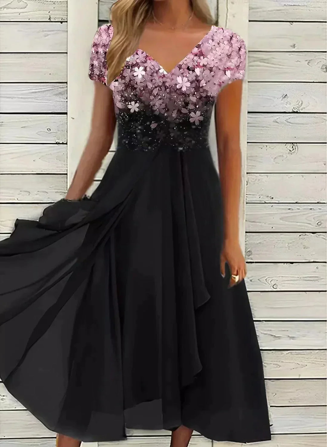 Close-up of the elegant fabric detail on a versatile women's glamorous dress, perfect for parties.