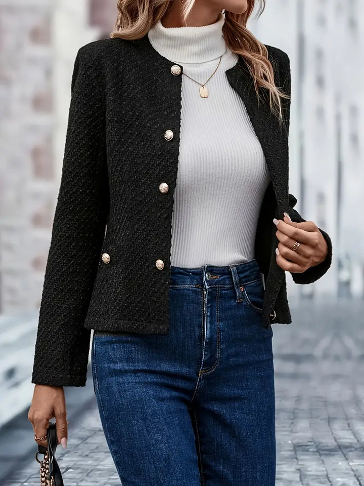 Stylish women's single-breasted blazer in black. A versatile tailored jacket for effortless style & comfort.