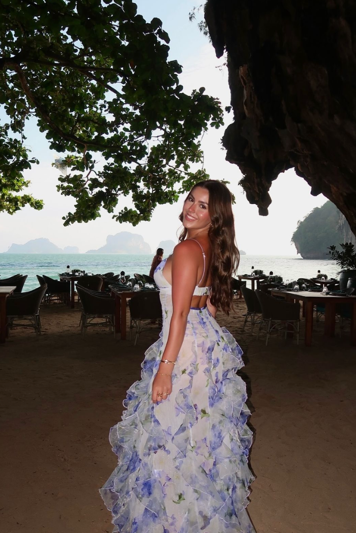 Stylish women's blue floral cut-out maxi dress, designed for comfortable and elegant summer wear.