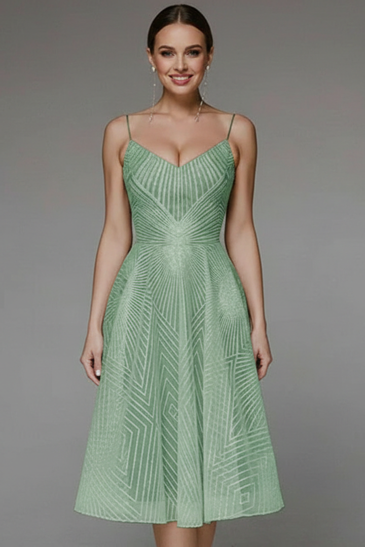 Close-up of the spaghetti straps on a women's A-line midi dress, highlighting the delicate detail.