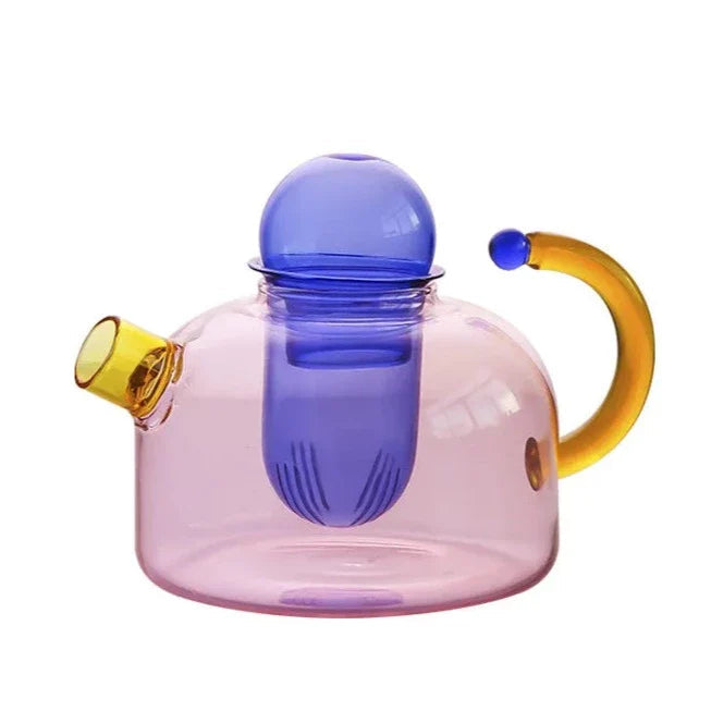 Borosilicate glass tea set serving steaming hot tea, perfect for tranquil moments.