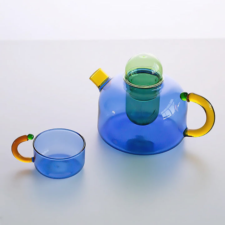 Crystal-clear borosilicate glass tea cup, elegant drinkware for hot or cold tea.