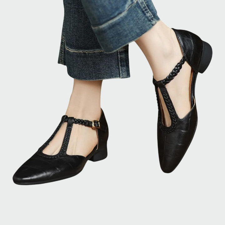 Classic black pointed toe T-bar Mary Jane shoes for women with stylish block heel, side view