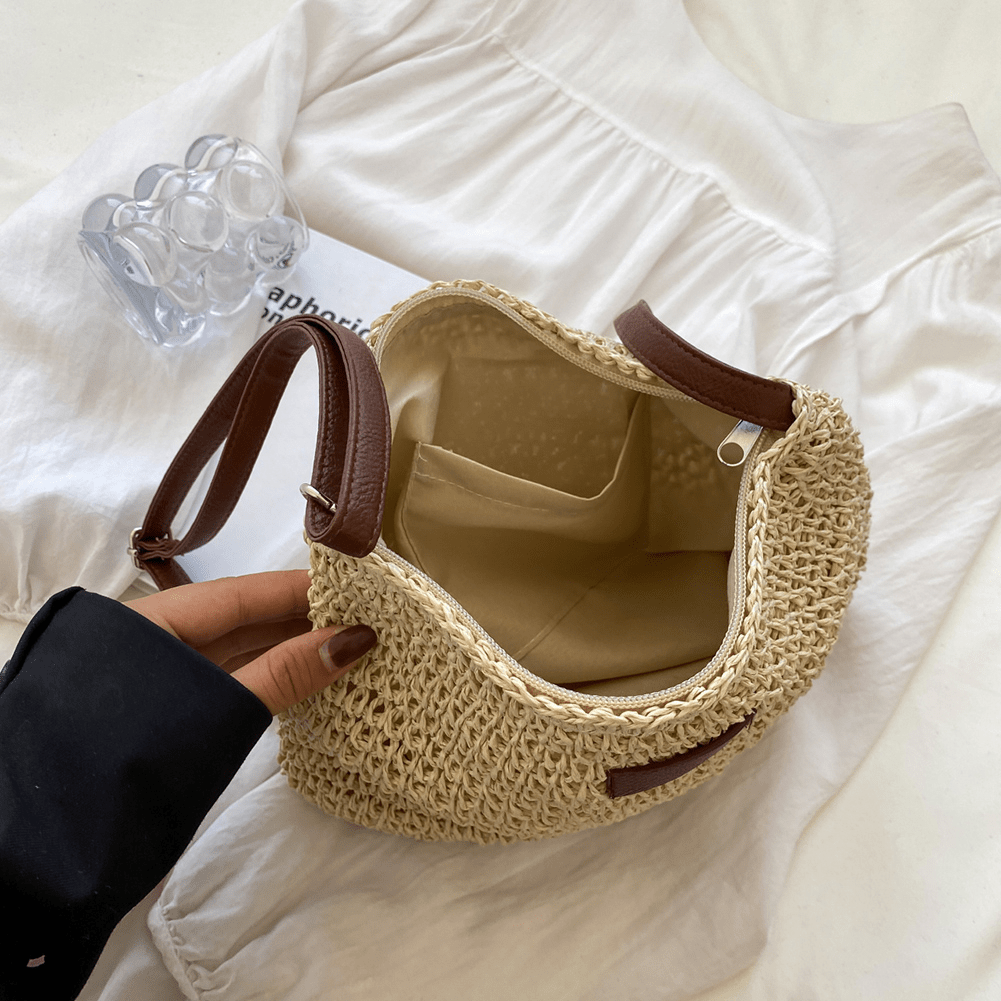 Women's versatile everyday brown handbag. Elegant fashion accessory with comfortable design.